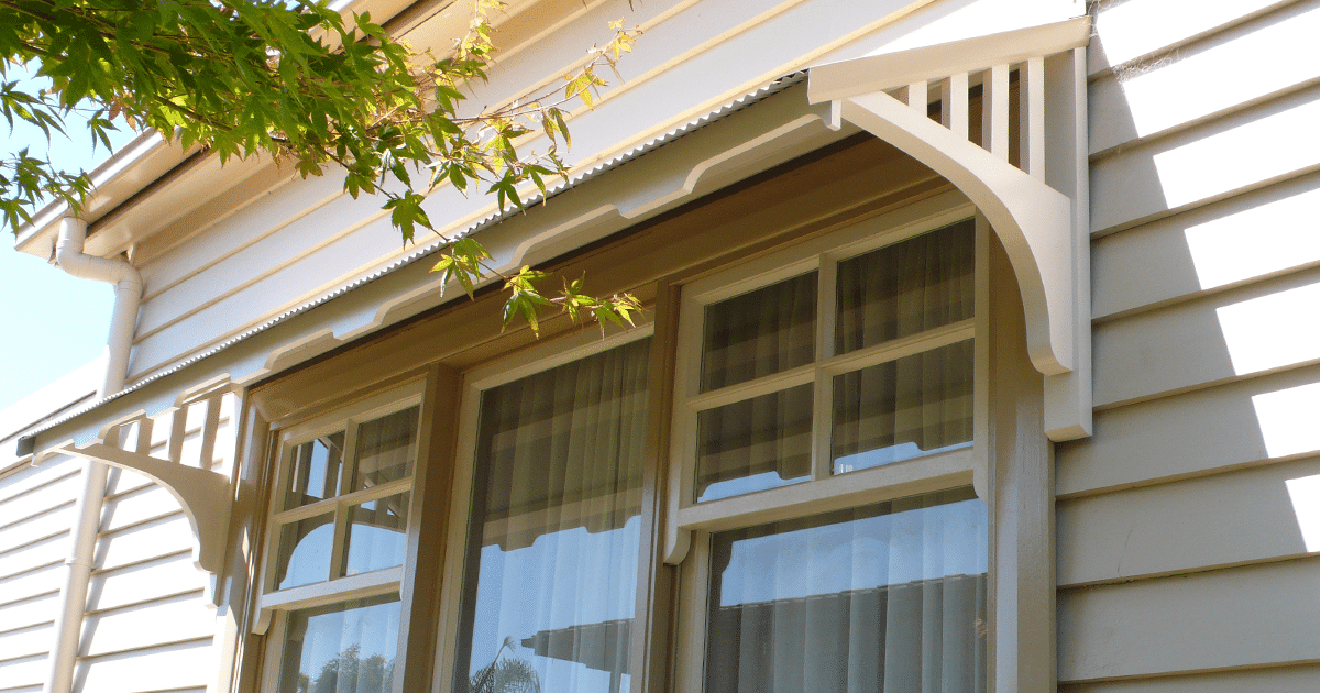 Timber Home with Window Canopies / Window Awnings on the window